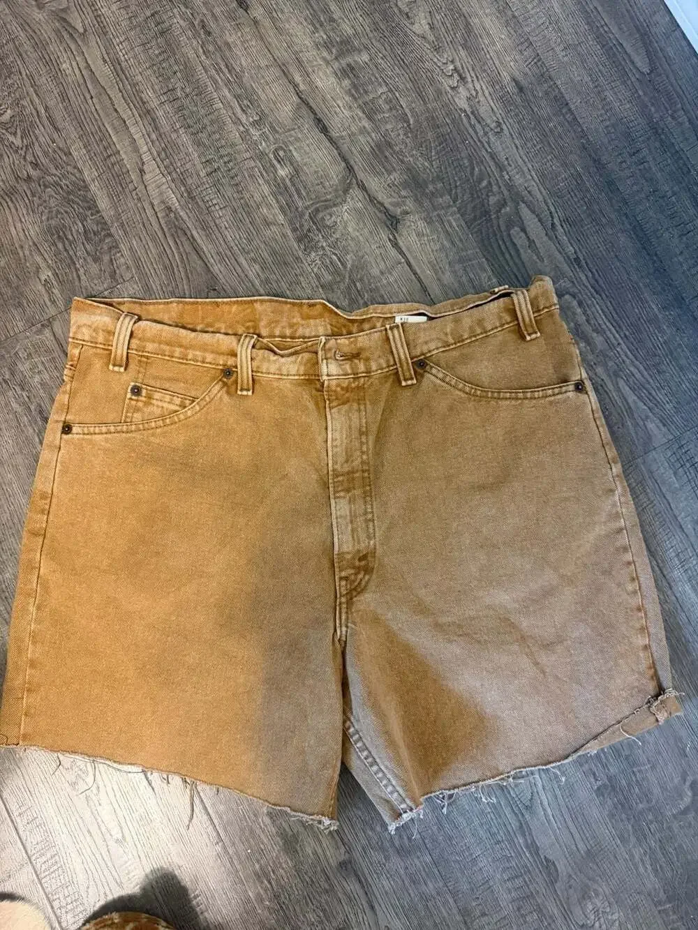 Vintage Levi's 550 Relaxed Fit Cut-Off Denim Shorts in Brown